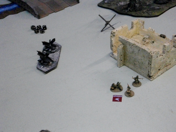 Across the way, the other infantry team attempt to get the MG-42 into cover.